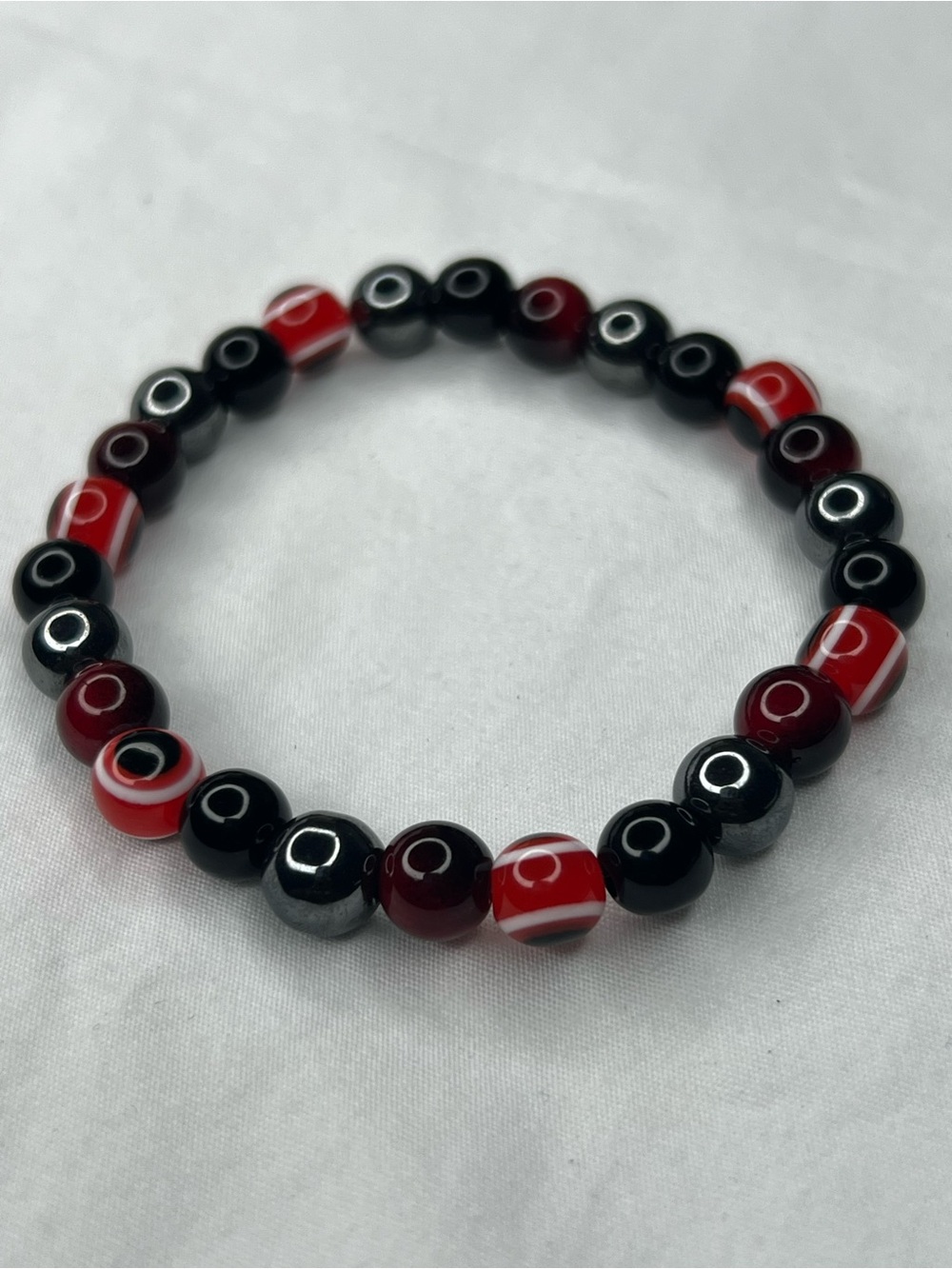 Red Tiger evil eyes and Black Beaded Stretch Bracelet